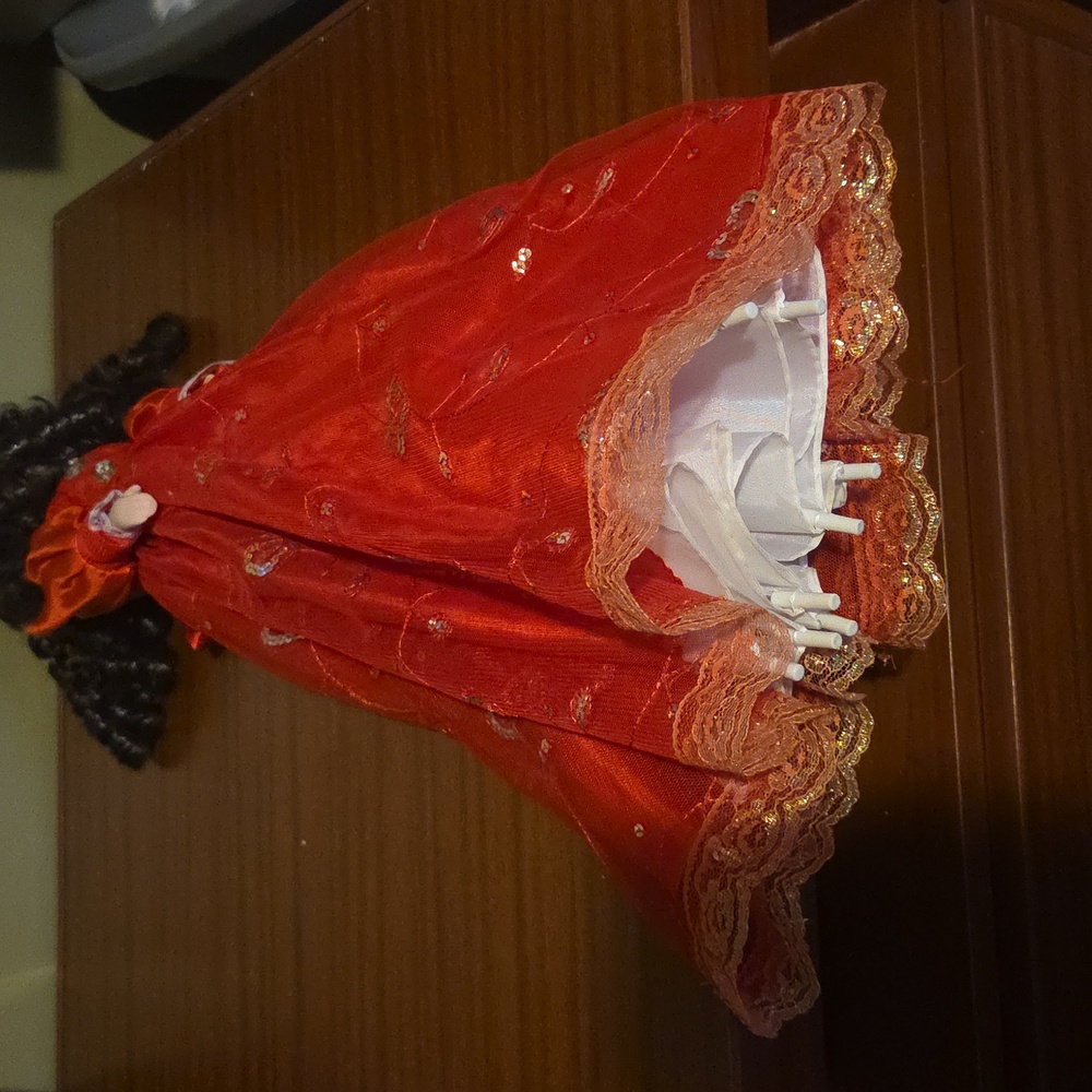 Charming Orange and Black Doll with Curly Hair - Picture 9 of 9